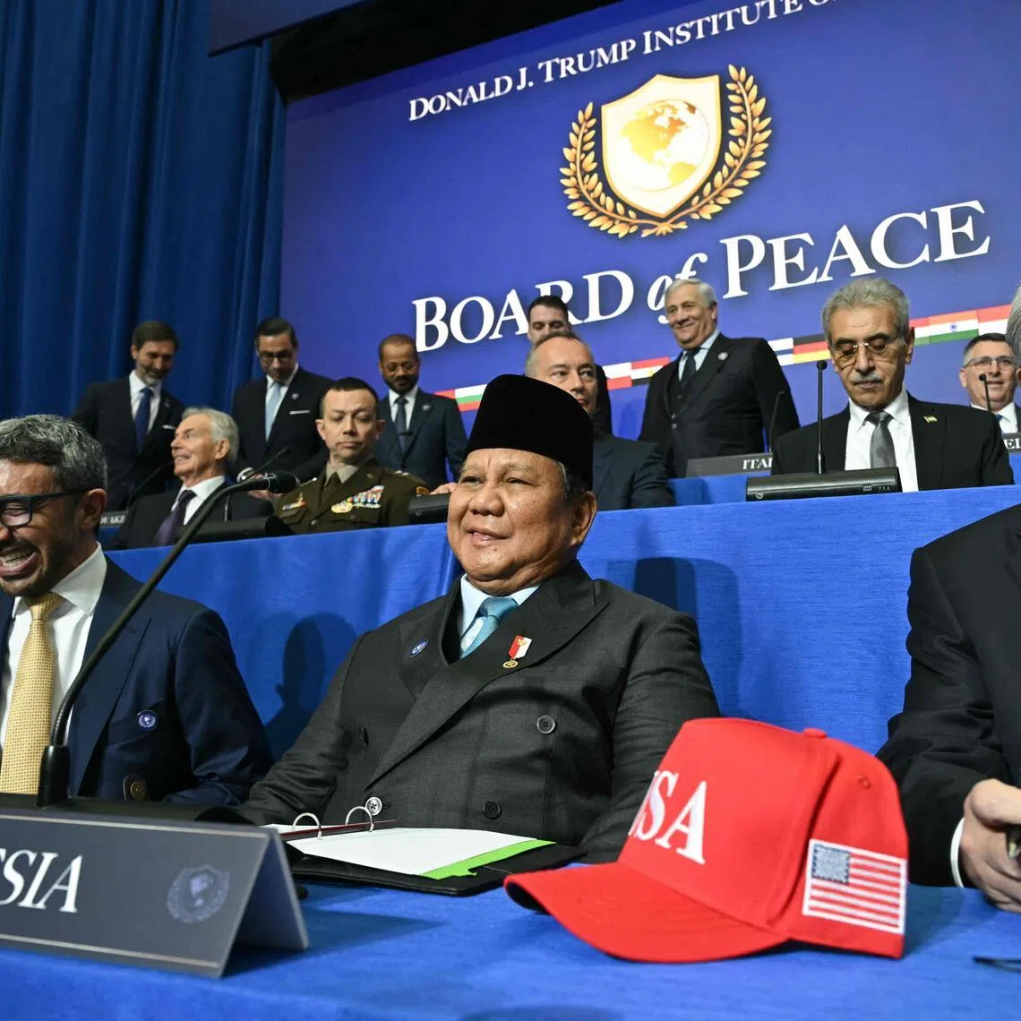 Indonesia's President Prabowo Subianto (front C) and Kazakhstan's President Kassym-Jomart Tokayev (front R) attend the inaugural meeting of the Board of Peace in Washington, DC, on Feb 19, 2026.  PHOTO: AFP