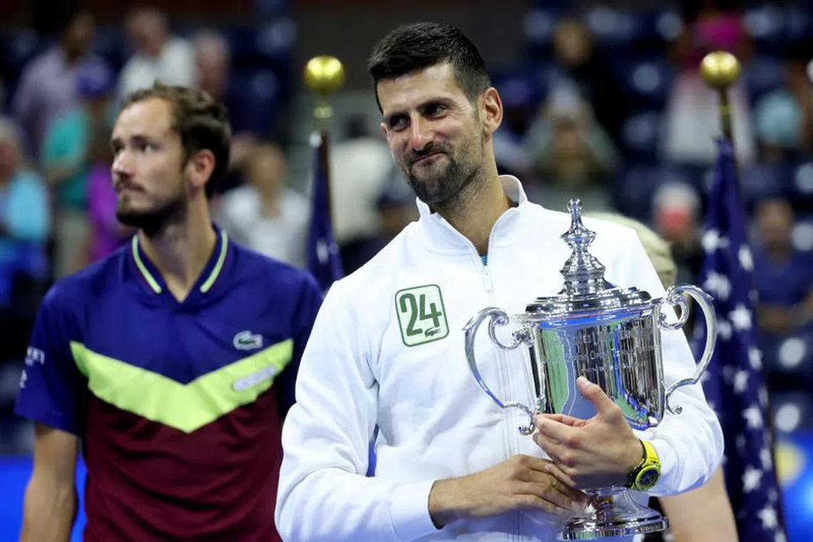 Tennis - U.S. Open - Flushing Meadows, New York, United States - September 10, 2023 Serbia's Novak Djokovic celebrates with the trophy after winning the U.S. Open against Russia's Daniil Medvedev REUTERS/Mike Segar