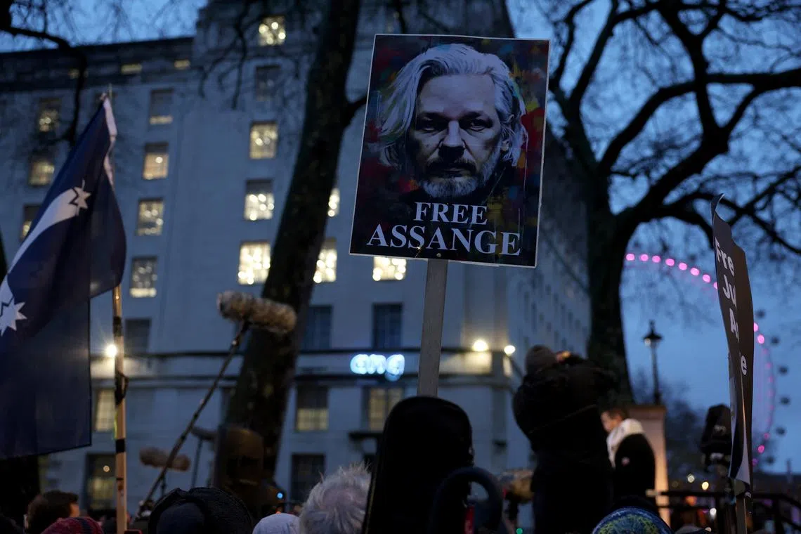 FILE PHOTO: Supporters of WikiLeaks founder Julian Assange demonstrate, on the day Assange appeals against his extradition to the United States, in London, Britain, February 21, 2024. REUTERS/Isabel Infantes/File Photo