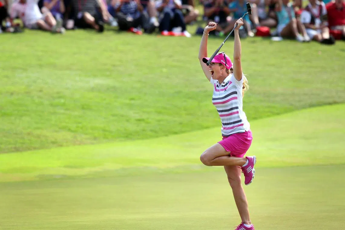 The best golf shot ever seen in Singapore? Paula Creamer jubilates after her 75-foot eagle putt to win the HSBC Women's Champions in 2014. 
