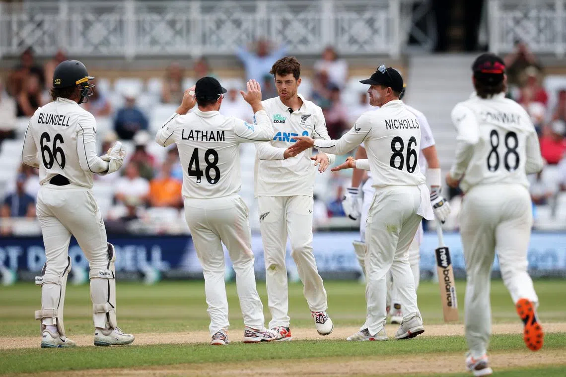 Cricket - England v New Zealand - Third Test - Trent Bridge Cricket Ground, Nottingham, Britain - June 29, 2026 New Zealand's Mitchell Santner celebrates after taking the lbw wicket of England's Gus Atkinson with teammates Action Images via Reuters/Andrew Boyers