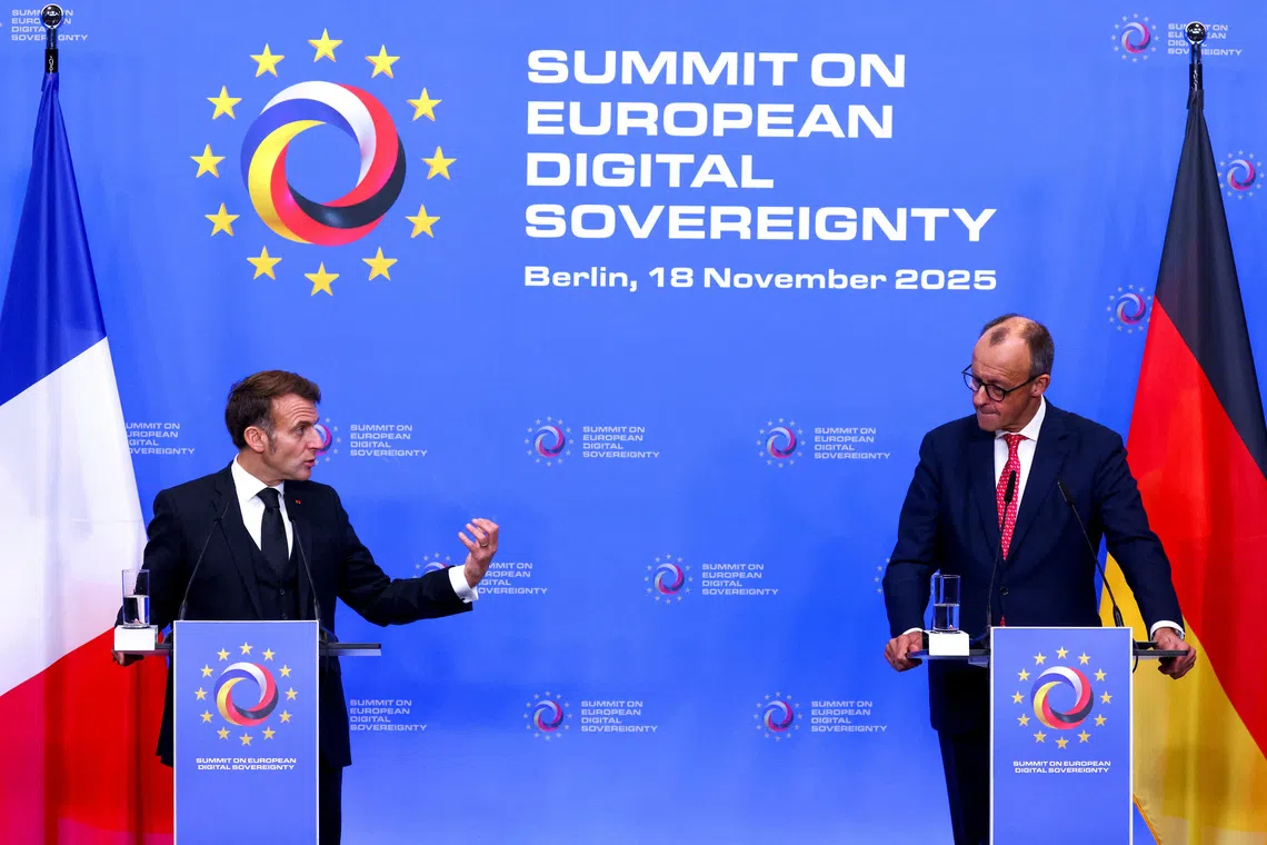 German Chancellor Friedrich Merz and French President Emmanuel Macron attend a joint press conference on the day of a Summit on European Digital Sovereignty, a high-level Franco-German meeting focused on discussing Europe's digital future, security, and independence, in Berlin, Germany, November 18, 2025.  REUTERS/Christian Mang