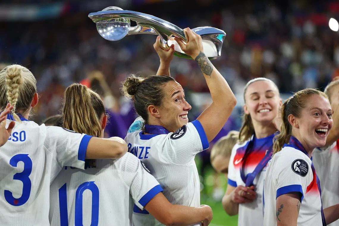 Soccer Football - UEFA Women's Euro 2025 - Final - England v Spain - St. Jakob-Park, Basel, Switzerland - July 27, 2025 England's Lucy Bronze celebrates with the trophy after winning the UEFA Women's Euro 2025 REUTERS/Matthew Childs