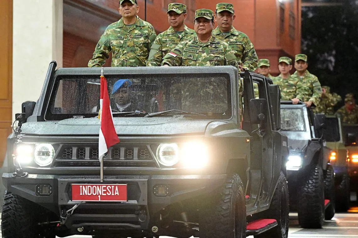 (FILES) This handout file picture taken and released by Indonesia's presidential palace on October 25, 2024 shows Indonesia's President Prabowo Subianto (3L) flanked by defense minister Sjafrie Sjamsoeddin (L), general Agus Subiyanto commander-in-chief of Indonesian army (2L) and police commissioner general Listyo Sigit Prabowo (C) at the military academy during their cabinet retreat in Magelang, Central Java. Greater military influence in government, reporters under threat and a stuttering economy -- Indonesian President Prabowo Subianto's first six months in power have triggered alarm bells for activists worried about a return to the country's authoritarian roots. (Photo by Handout / PRESIDENTIAL PALACE / AFP) / RESTRICTED TO EDITORIAL USE - MANDATORY CREDIT "AFP PHOTO /  INDONESIA'S PRESIDENTIAL PALACE " - NO MARKETING NO ADVERTISING CAMPAIGNS - DISTRIBUTED AS A SERVICE TO CLIENTS

To go with AFP story Indonesia-politics-economy-army-rights, FOCUS