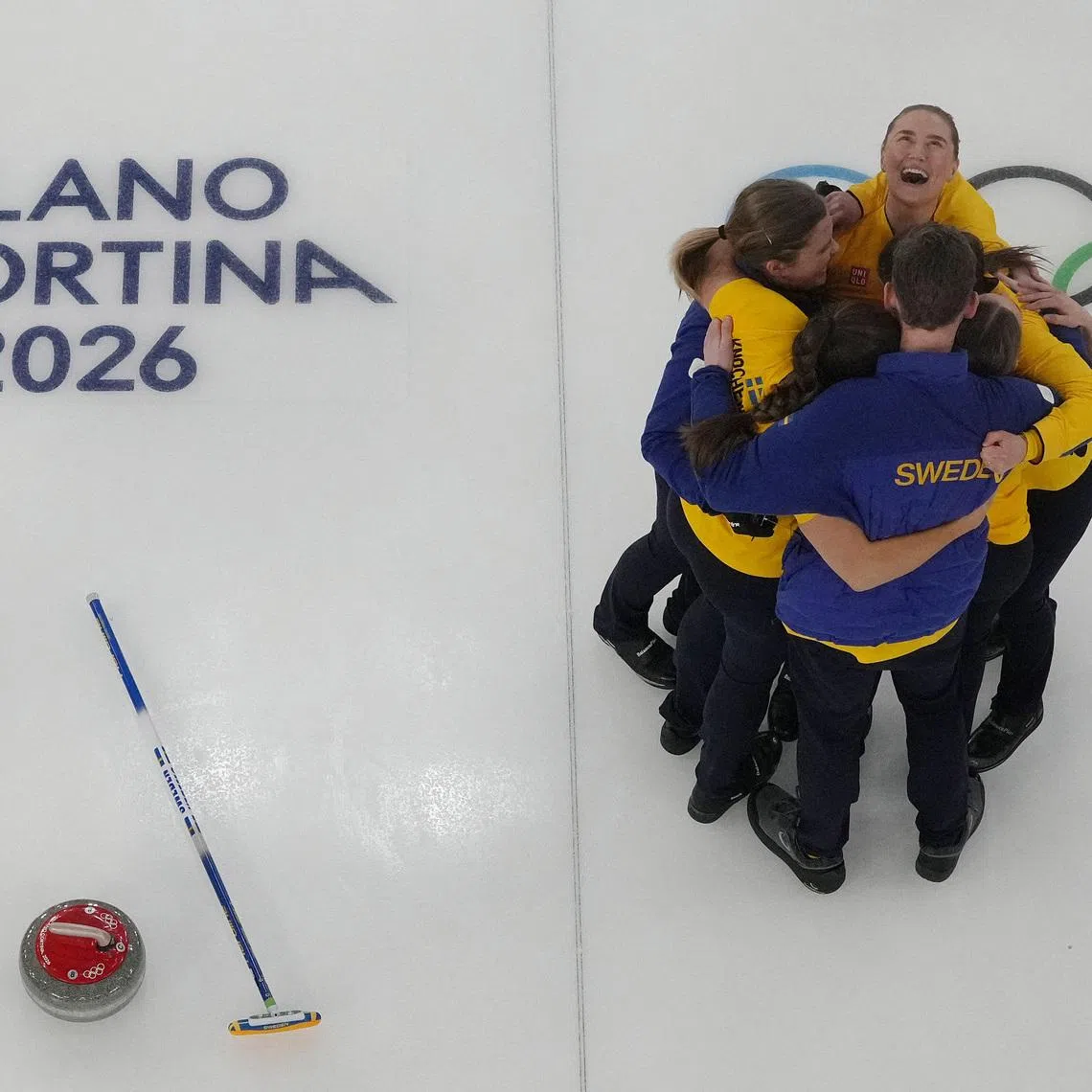 Milano Cortina 2026 Olympics - Curling - Women's Semi-final - Canada vs Sweden - Cortina Curling Olympic Stadium, Cortina d'Ampezzo, Italy - February 20, 2026. Team Sweden celebrates after winning the match against Canada REUTERS/Issei Kato