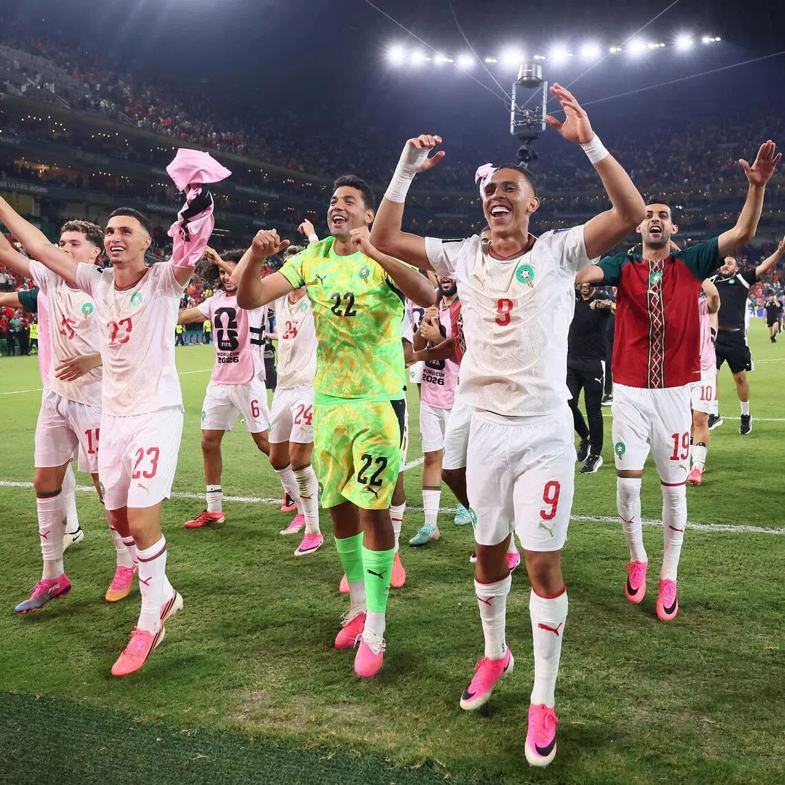 Soccer Football - FIFA World Cup 2026 - Round of 32 - Netherlands v Morocco - Estadio Monterrey, Monterrey, Mexico - June 29, 2026
Morocco's Soufiane Rahimi, Ahmed Reda Tagnaouti and teammates celebrate after the match as Morocco qualify for the Round of 16 stage of the World Cup REUTERS/Eloisa Sanchez     TPX IMAGES OF THE DAY