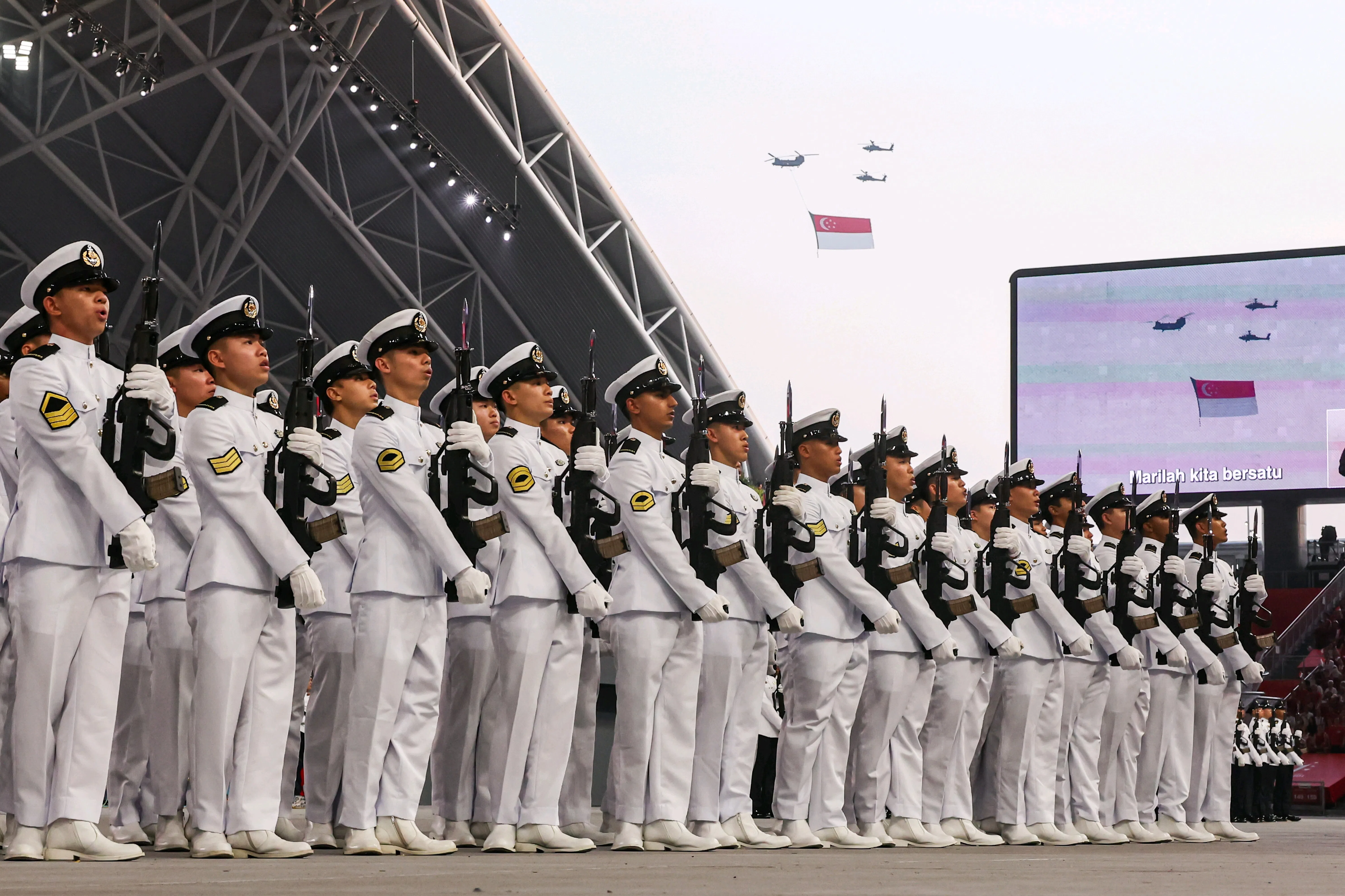 The National Anthem is sung during the state flag flypast in National Day Parade 2026 at the National Stadium on Aug 9, 2026. ST PHOTO: BRIAN TEO