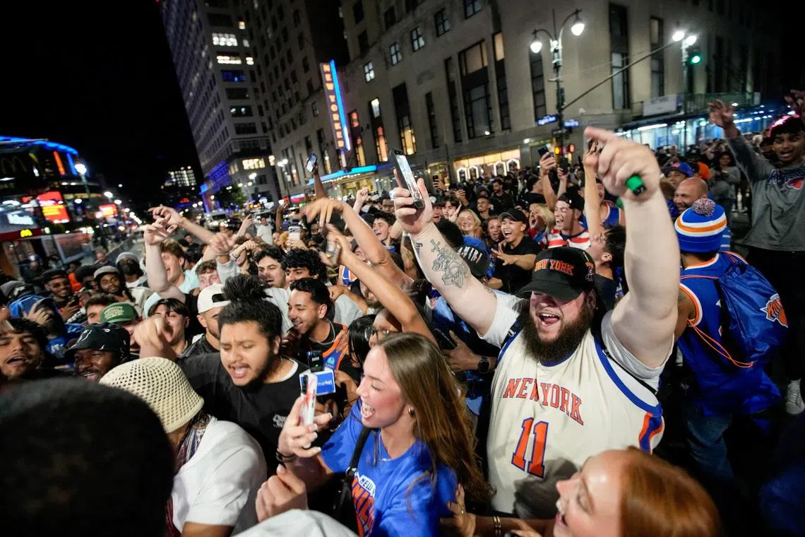 Fans block 8th Avenue near Madison Square Garden after the Game 3 of the NBA Finals between the New York Knicks and San Antonio Spurs in New York City, U.S., June 8, 2026. REUTERS/Eduardo Munoz