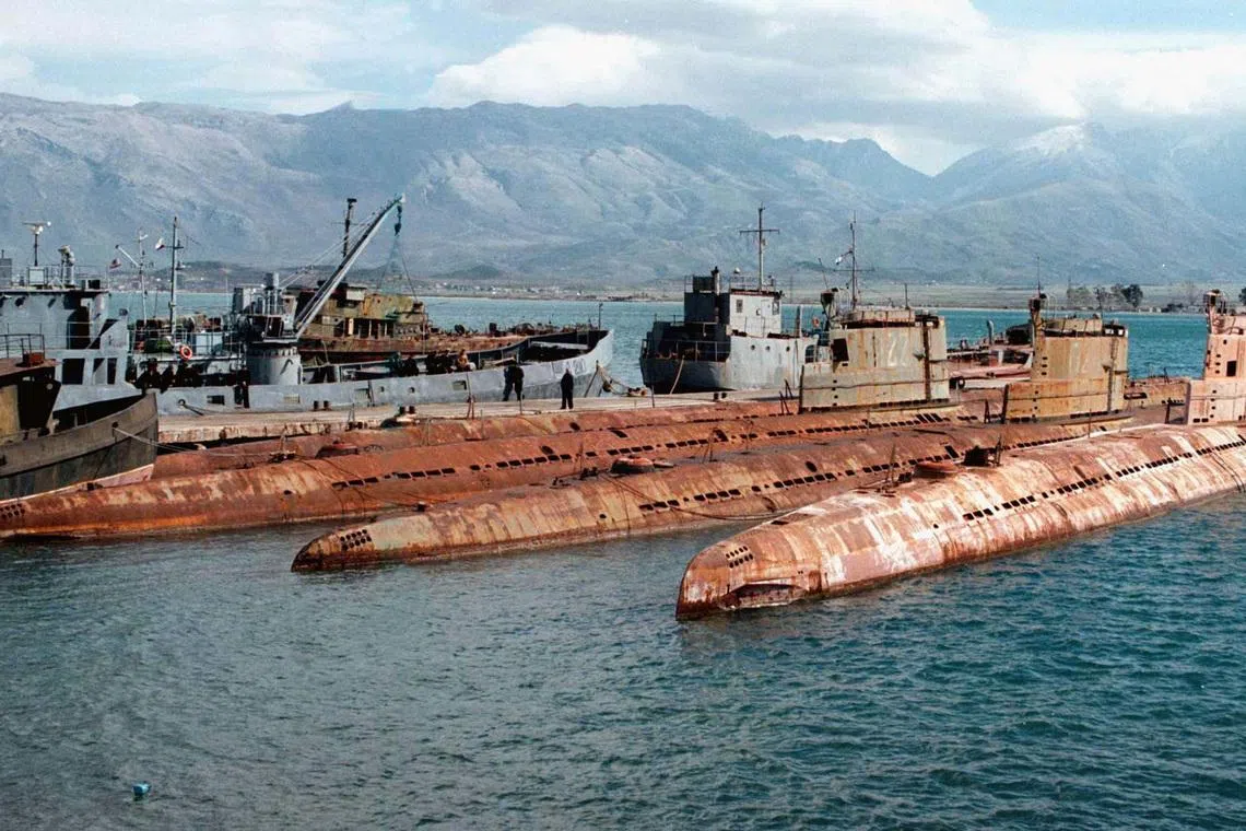 FILE PHOTO: Albanian submarines demolished during the civil unrest in March 1997, are shown at the Pashaliman naval base in Vlore, some 170 km from Tirana, February 28, 2001. REUTERS//File Photo