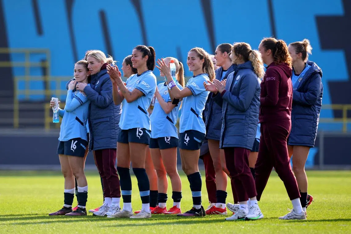 FILE PHOTO: Soccer Football - Women's FA Cup - Quarter Final - Manchester City v Aston Villa - Manchester City Academy Stadium, Manchester, Britain - March 9, 2025 Manchester City players celebrate after the match Action Images via Reuters/Ed Sykes/File Photo