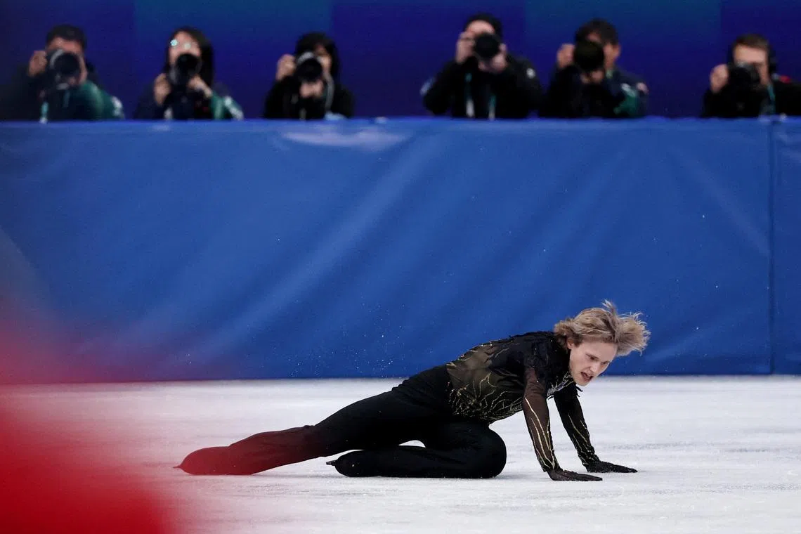 FILE PHOTO: Milano Cortina 2026 Olympics - Figure Skating - Men Single Skating - Free Skating - Milano Ice Skating Arena, Milan, Italy - February 13, 2026. Ilia Malinin of United States falls during the Free Skating REUTERS/Yara Nardi/File Photo