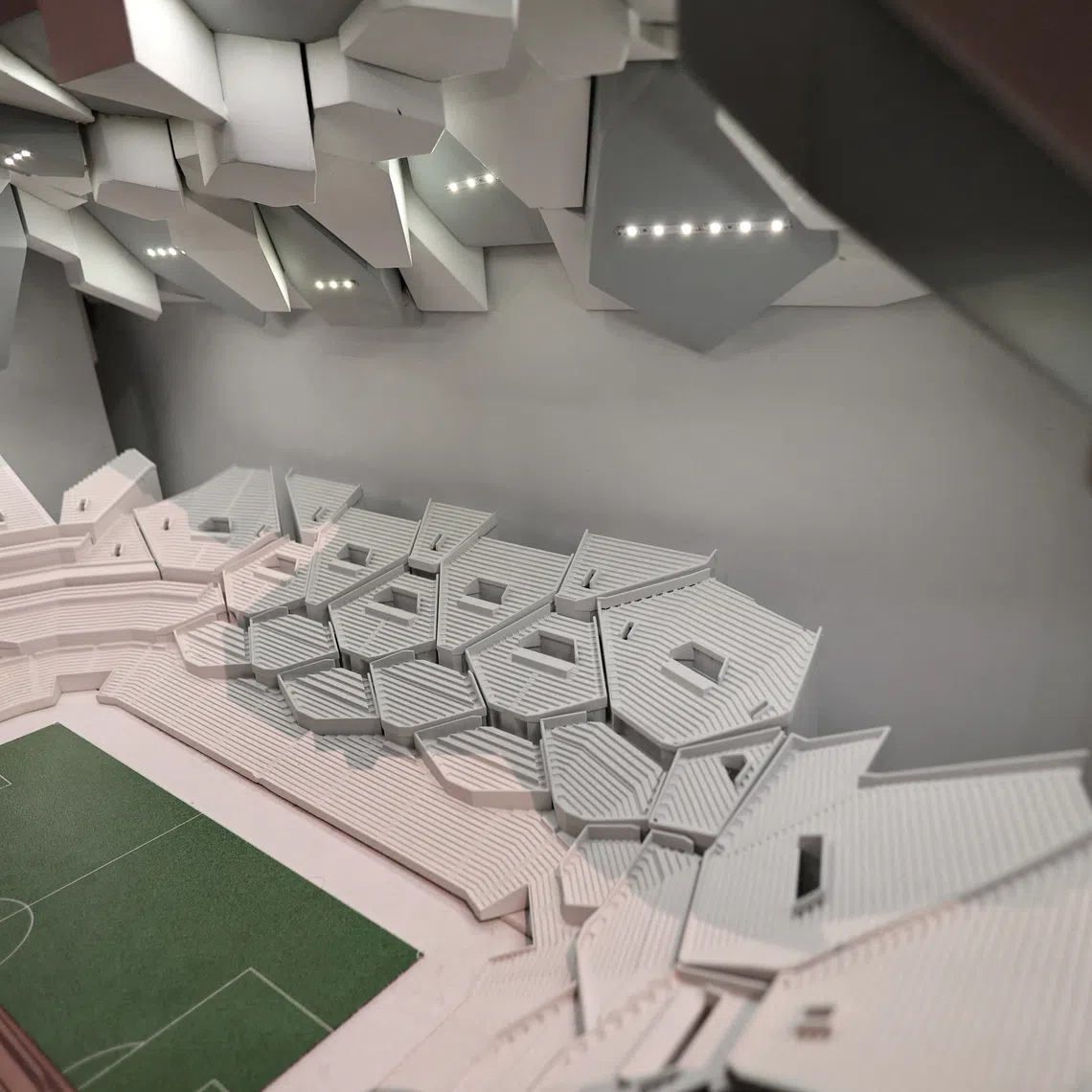A model of the proposed NEOM Stadium seen inside the Saudi Arabia World Cup bid exhibition.