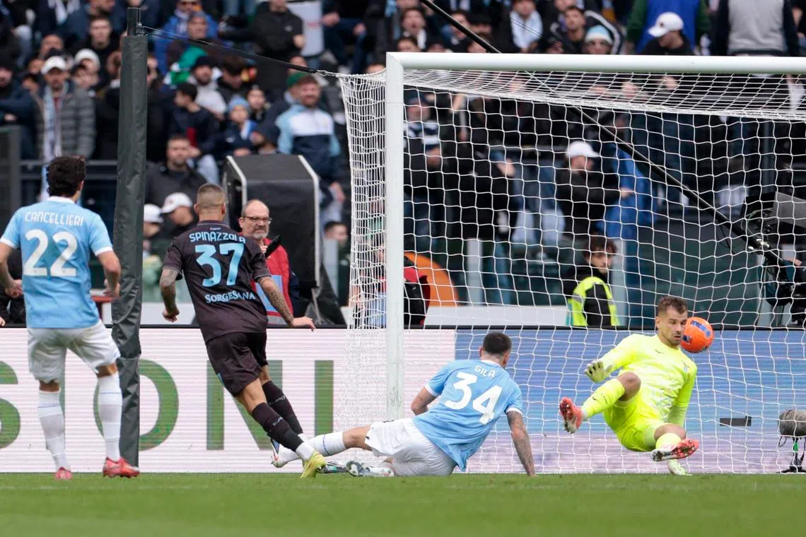 Soccer Football - Serie A - Lazio v Napoli - Stadio Olimpico, Rome, Italy - January 4, 2026 Napoli's Leonardo Spinazzola scores their first goal past Lazio's Ivan Provedel REUTERS/Remo Casilli