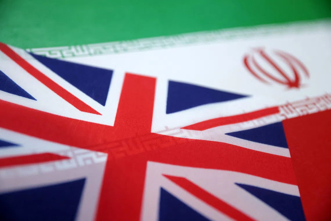 UK and Iran flags are seen in this illustration taken June 18, 2025. REUTERS/Dado Ruvic/Illustration