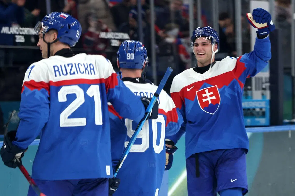 Ice hockey-Sweden overcome surprise Italy fight, Slovakia stun defending champs Finland