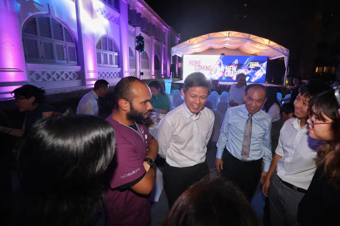 Education Minister Chan Chun Sing and Mr Lim Chuan Poh, chairman of LKCMedicine’s governing board (on Mr Chan's left), speaking to LKCMedicine students at a homecoming event on Aug 1.