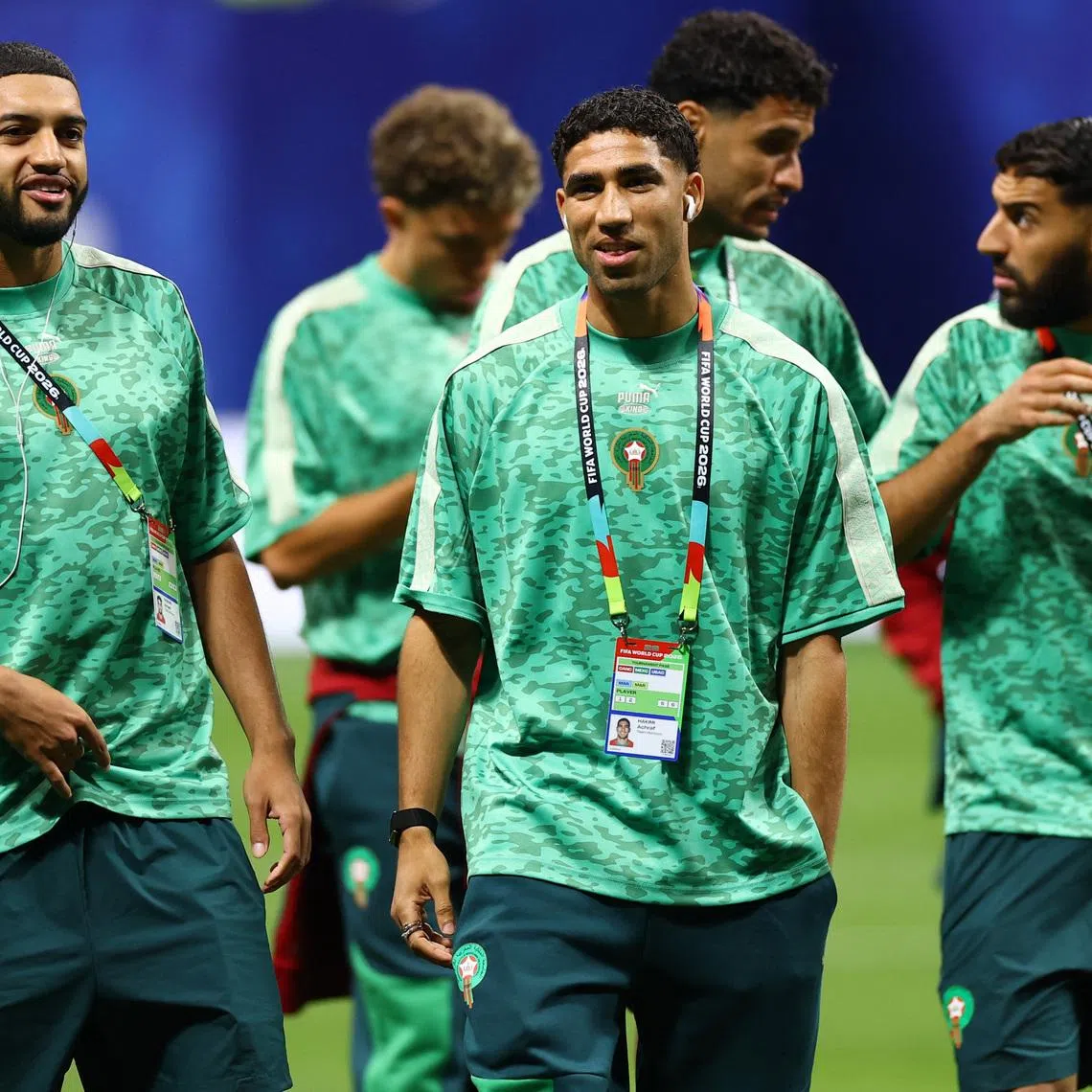 Soccer Football - FIFA World Cup 2026 - Group C - Morocco v Haiti - Atlanta Stadium, Atlanta, Georgia, U.S. - June 24, 2026 Morocco's Achraf Hakimi and Ismael Saibari walk on the pitch before the match REUTERS/Claudia Greco