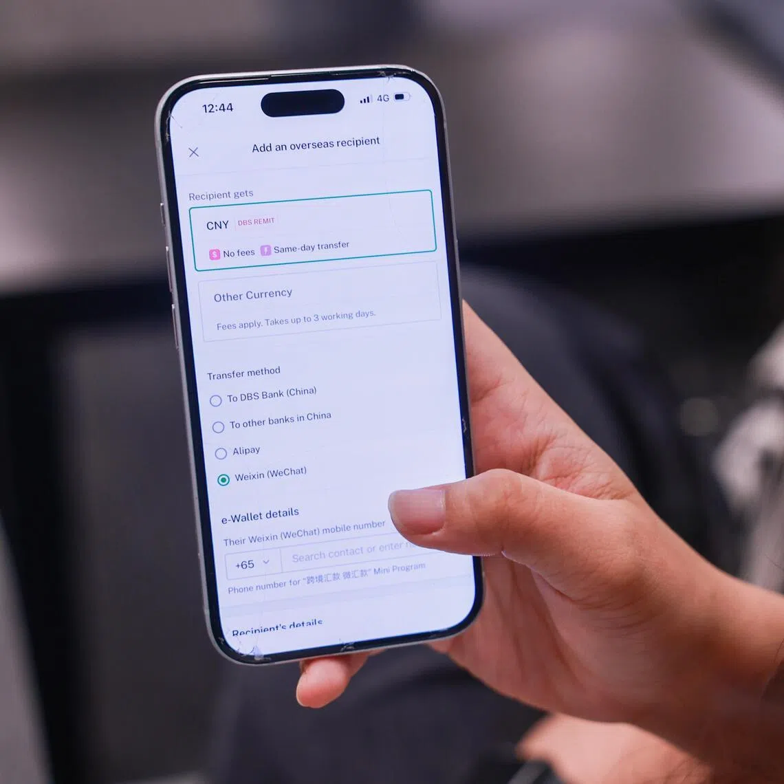 DBS Bank's new feature allows non-Chinese users to remit funds directly from their bank account to their WeChat Pay e-wallet - allowing them to pay without incurring additional fees.