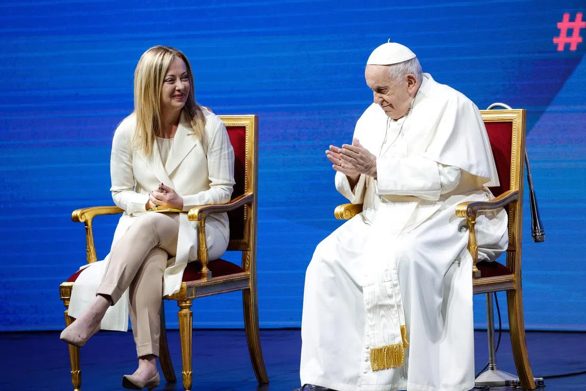 Italian PM Giorgia Meloni and Pope Francis attend a conference on the growing population crisis in Italy, on May 12.