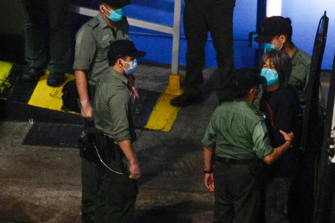 FILE PHOTO: Pro-democracy activist Leung Kwok-hung, also known as \"Long Hair\", arrives at Lai Chi Kok Reception Centre by prison van after being sentenced for unauthorised assembly, in Hong Kong, China April 16, 2021. REUTERS/Tyrone Siu
