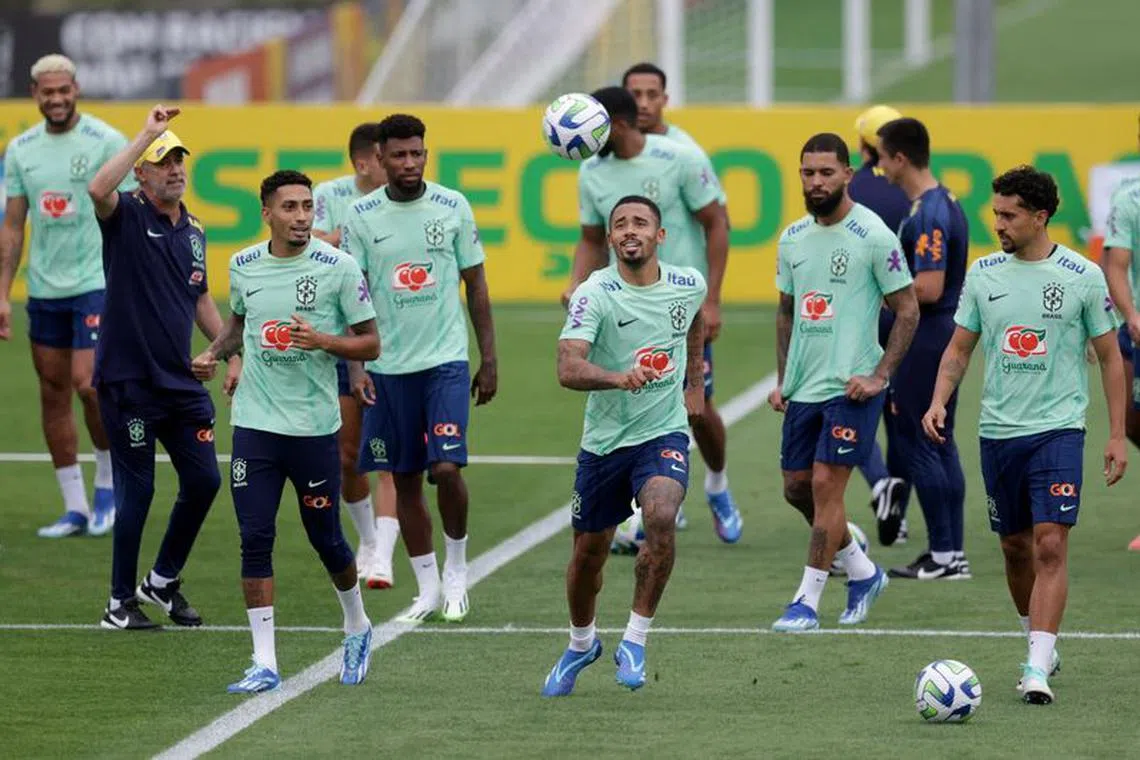 Soccer Football - World Cup - South American Qualifiers - Brazil Training - Granja Comary, Teresopolis, Brazil - November 19, 2023 Brazil's Marquinhos, Gabriel Jesus and Raphinha during training REUTERS/Ricardo Moraes/File Photo