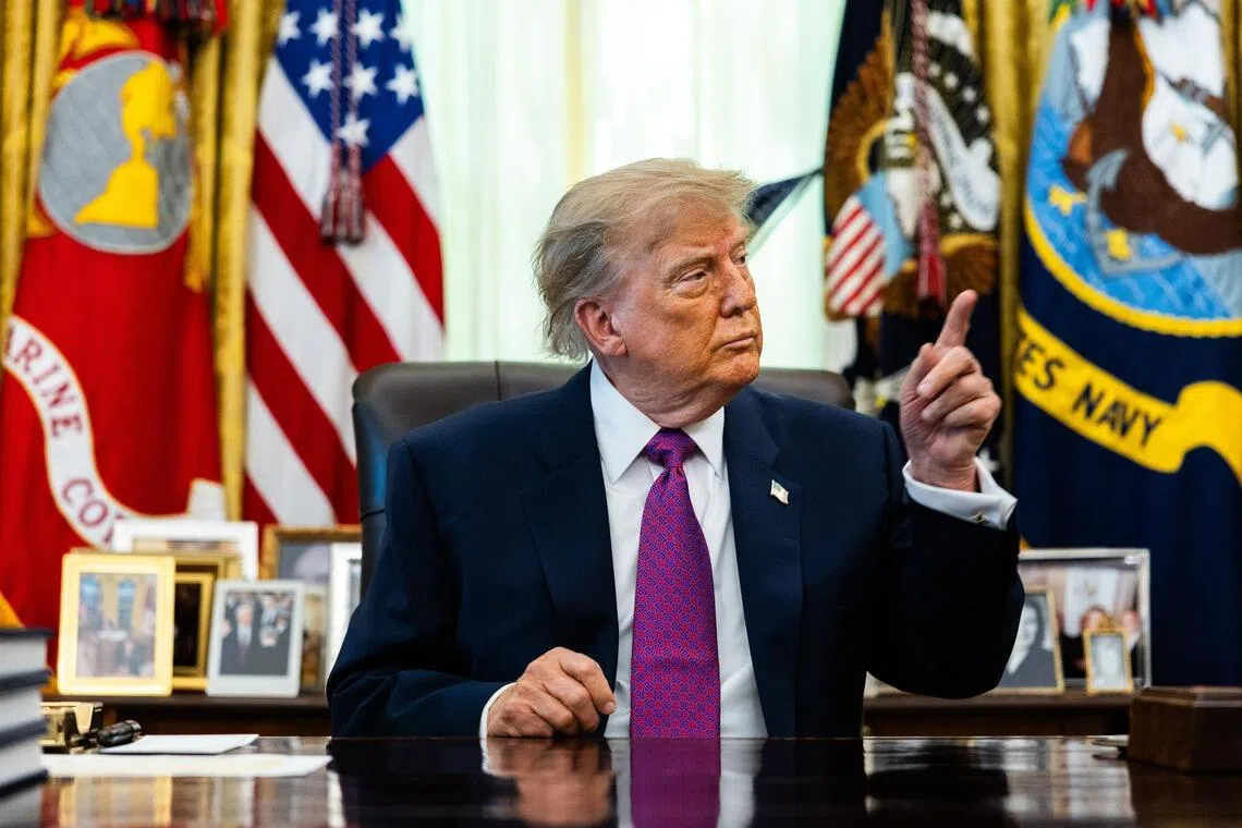President Donald Trump taking a question from a reporter in the Oval Office of the White House on Aug 27.