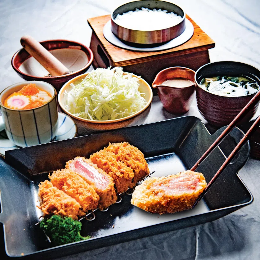 Thick Iberico Loin Katsu Set at Gochiya (left) and Mangalica Hungarian Rosu Katsu at Shin Katsu.