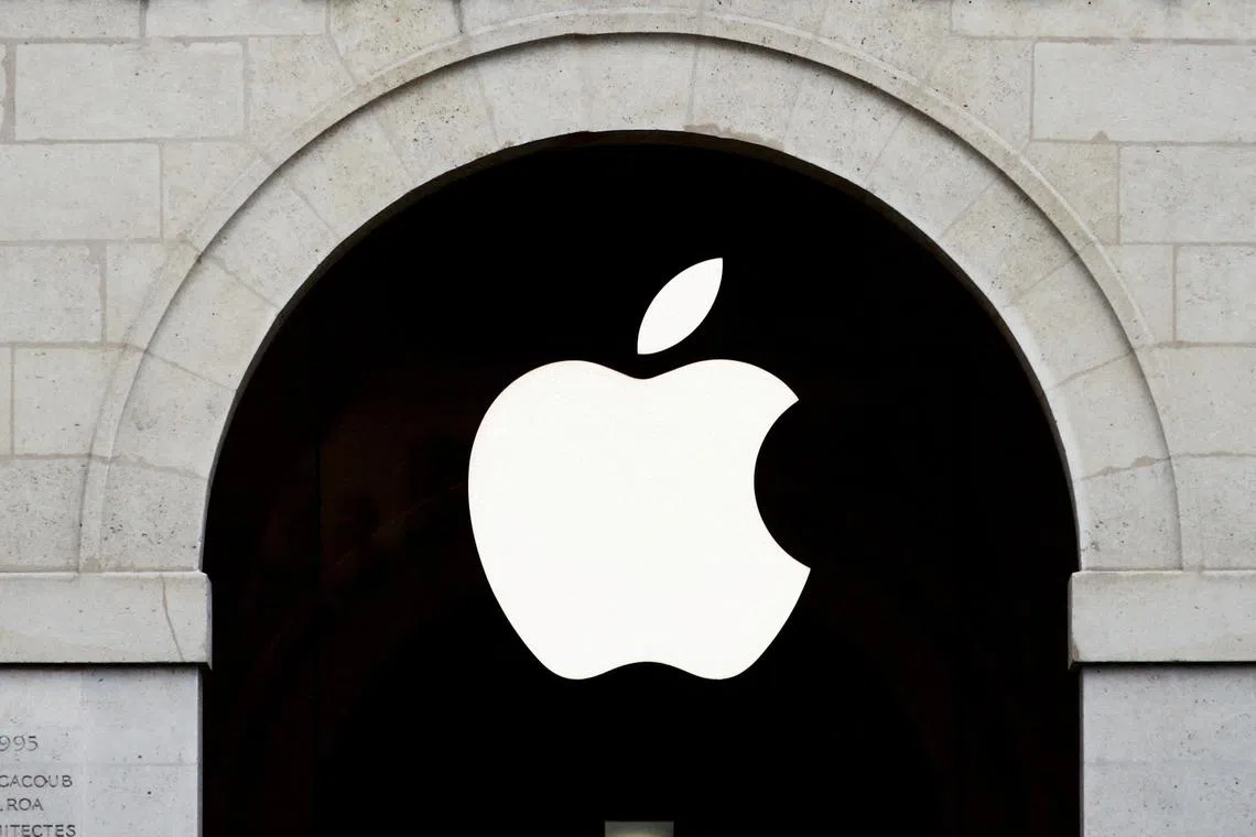 FILE PHOTO: Apple logo is seen on the Apple store at The Marche Saint Germain in Paris, France July 15, 2020.  REUTERS/Gonzalo Fuentes/File Photo/File Photo