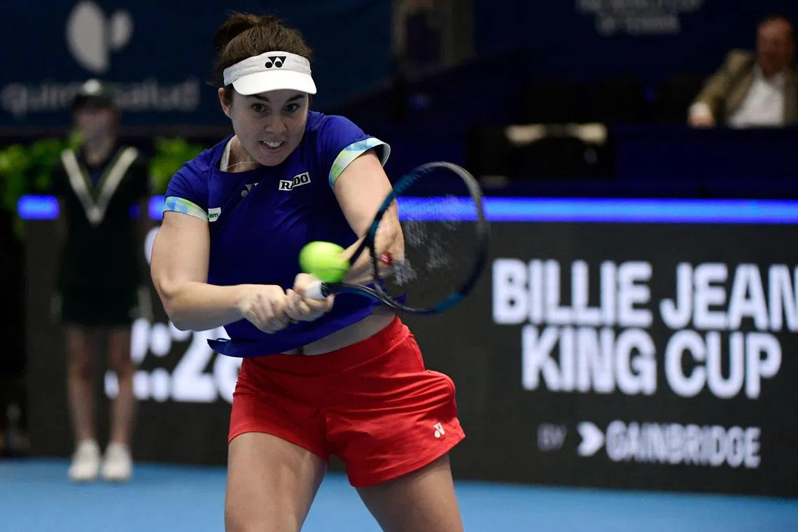 Czech Republic's Linda Noskova returns the ball to Switzerland's Celine Naef during the Billie Jean King Cup Finals in Seville, Spain.