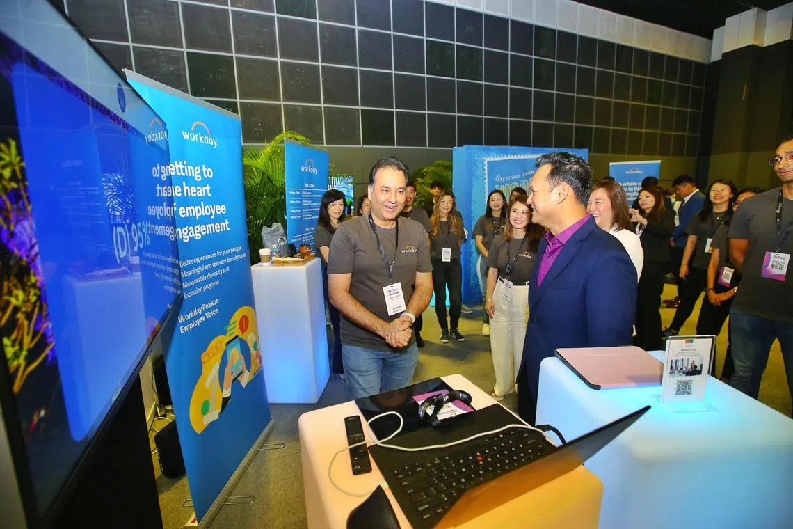 Manpower Senior Minister of State Mr Zaqy Mohamad (right) at HR Tech Festival 2023.. More than 70 HR tech solutions firms are exhibiting at the HR Tech Festival 2023, now into its 23rd year. 


 /HR Tech Festival Asia 2023 [Suntec Convention, Level 4, Halls 403-405, Engage Theatre]