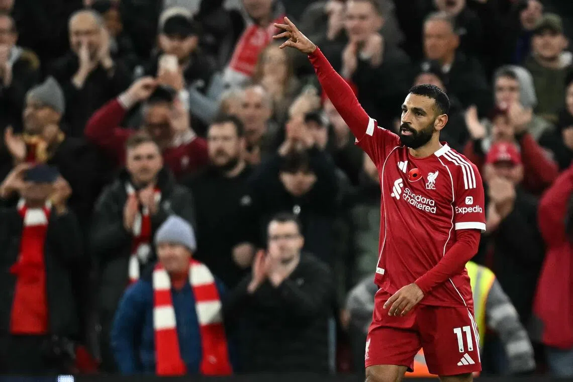 Liverpool striker Mohamed Salah celebrates scoring the opening goal - his 250th for the club.