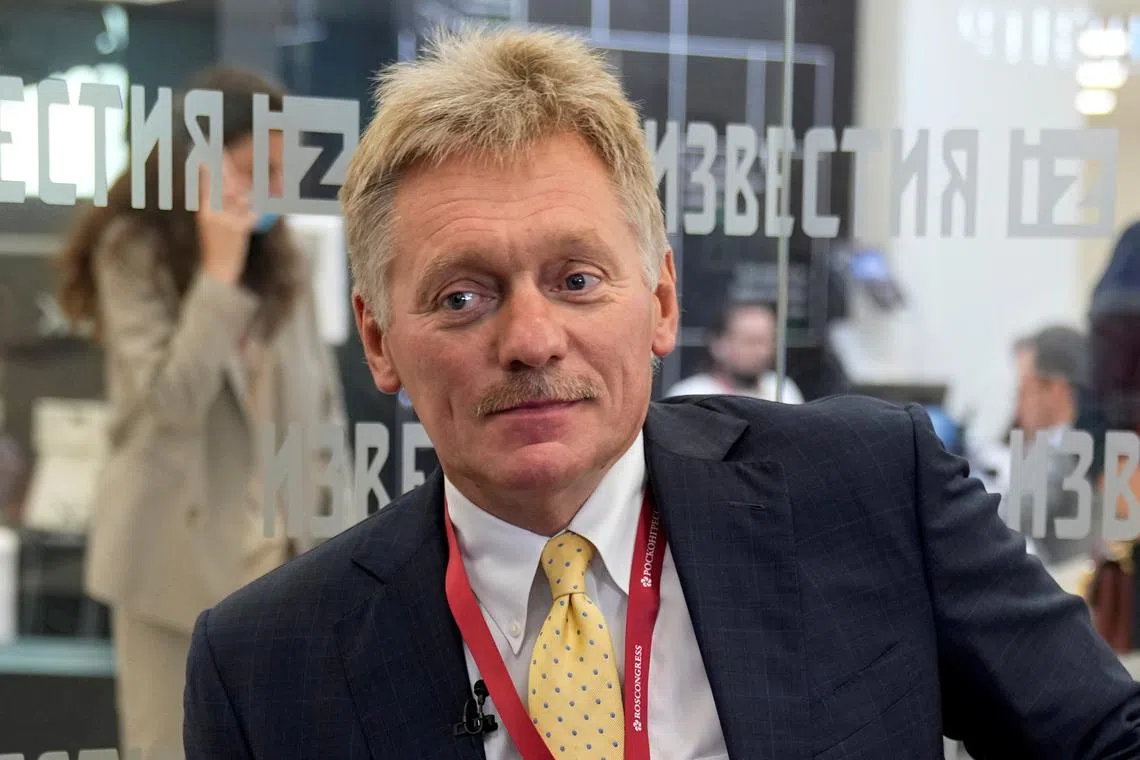 FILE PHOTO: Kremlin spokesman Dmitry Peskov prepares for an interview with Russian TV channel \"Izvestia\" on the sidelines of the Eastern Economic Forum in Vladivostok, Russia, September 2, 2021. Alexander Zemlianichenko/Pool via REUTERS/File Photo