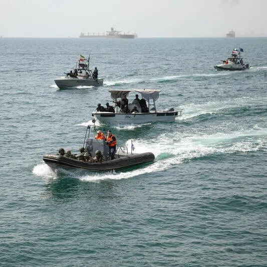 A handout photo made available by the Iranian army shows Iranian and Russian soldiers during a joint naval exercise in Sea of Oman, southern Iran, on Feb 19.