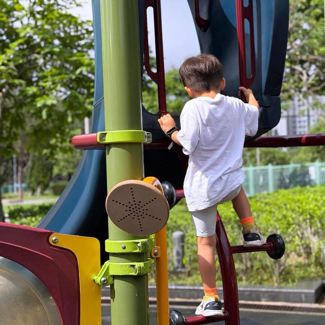 Barbie Ho’s six-year-old son plays at a playground near their home in Mui Wo, Hong Kong.