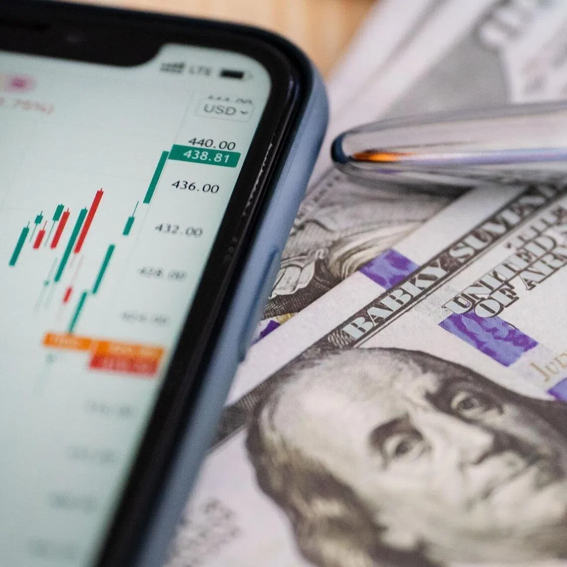 Banks and online brokers are regulated by the Monetary Authority of Singapore, despite having different licences.