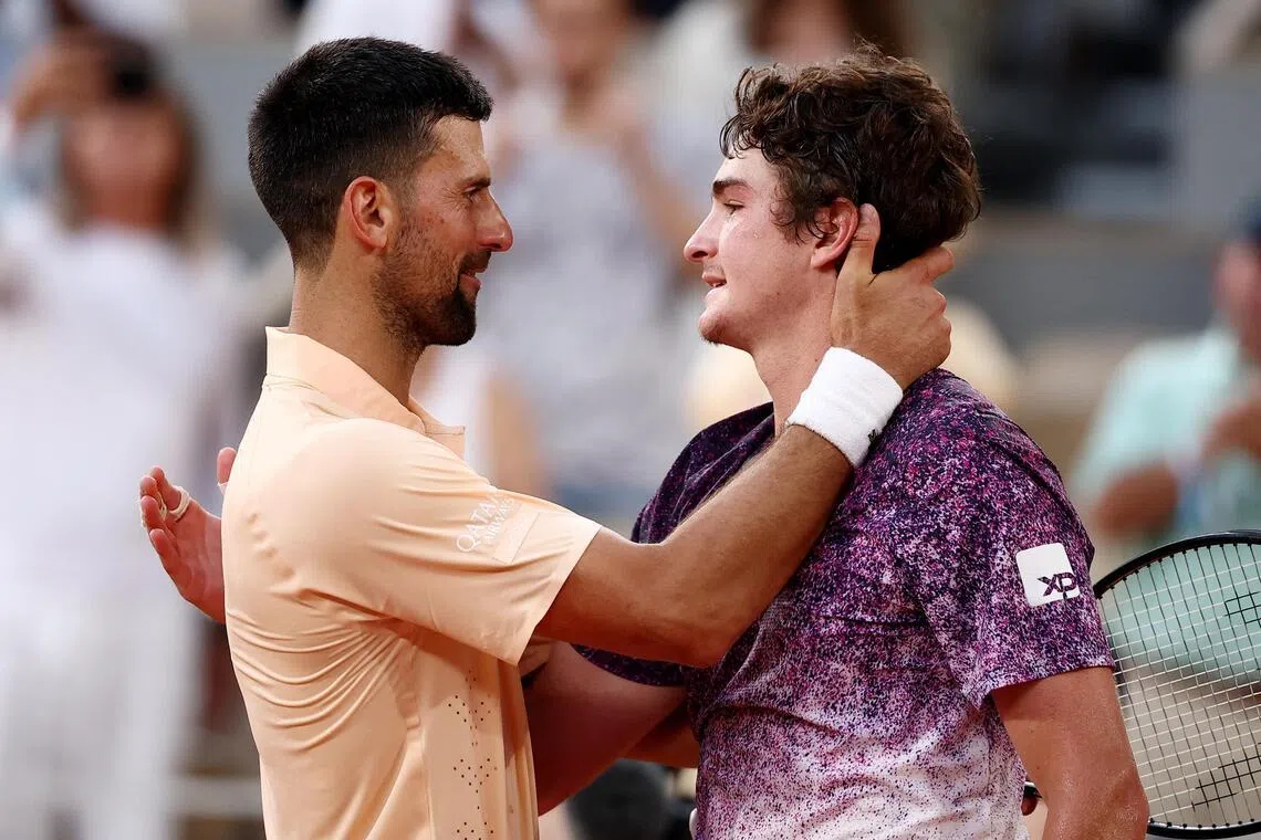 Serbia's Novak Djokovic congratulating Brazil's Joao Fonseca on his third-round 4-6 4-6 6-3 7-5 7-5 win on May 29.