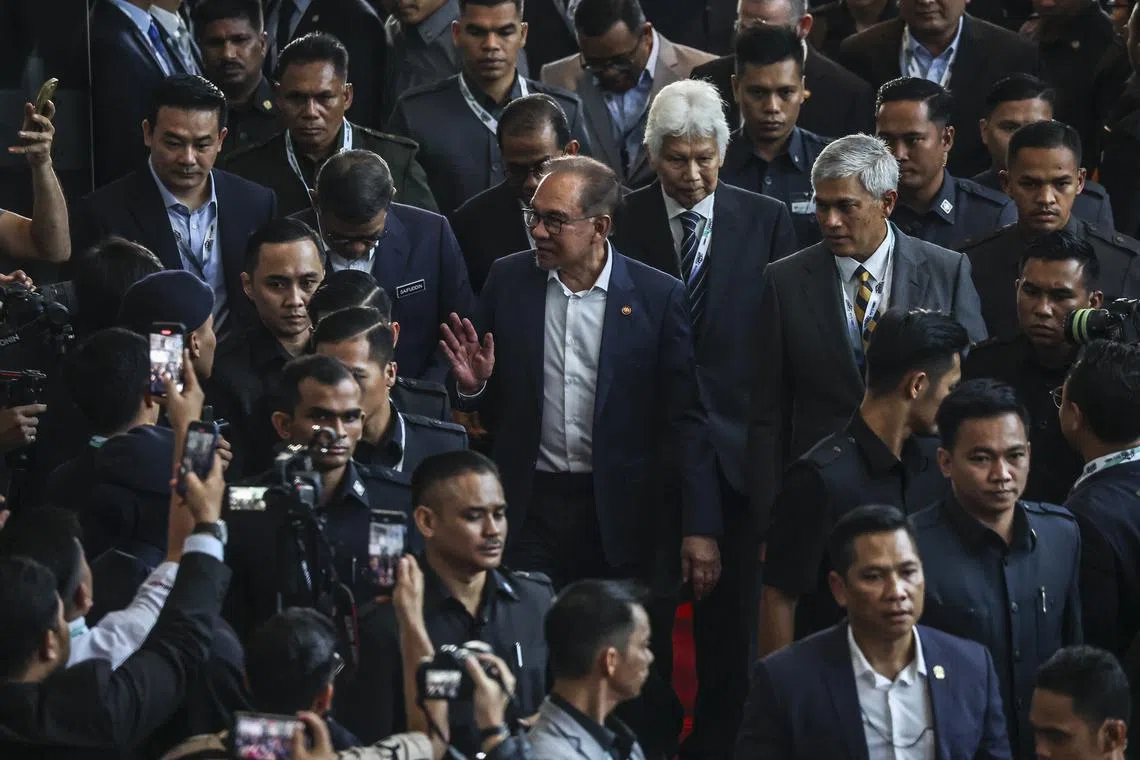 Malaysian PM Anwar Ibrahim (centre) arriving at the Defence Services Asia and National Security Asia 2024 in Kuala Lumpur on May 6.