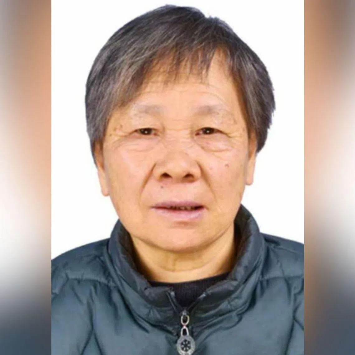 Ms Chen Bi Yu was last seen in a multi-coloured top with grey pants.