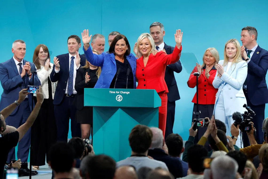 Sinn Fein President Mary Lou McDonald waves with Sinn Fein Vice President Michelle O’Neill after delivering her speech at the Sinn Fein annual party conference in Athlone, Ireland September 28, 2024. REUTERS/Clodagh Kilcoyne/File Photo