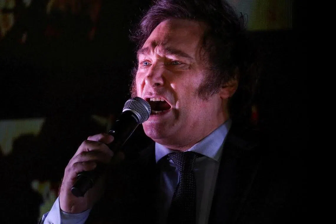 FILE PHOTO: Argentine president-elect Javier Milei addresses supporters after winning Argentina's runoff presidential election, in Buenos Aires, Argentina November 19, 2023. REUTERS/Cristina Sille/File Photo