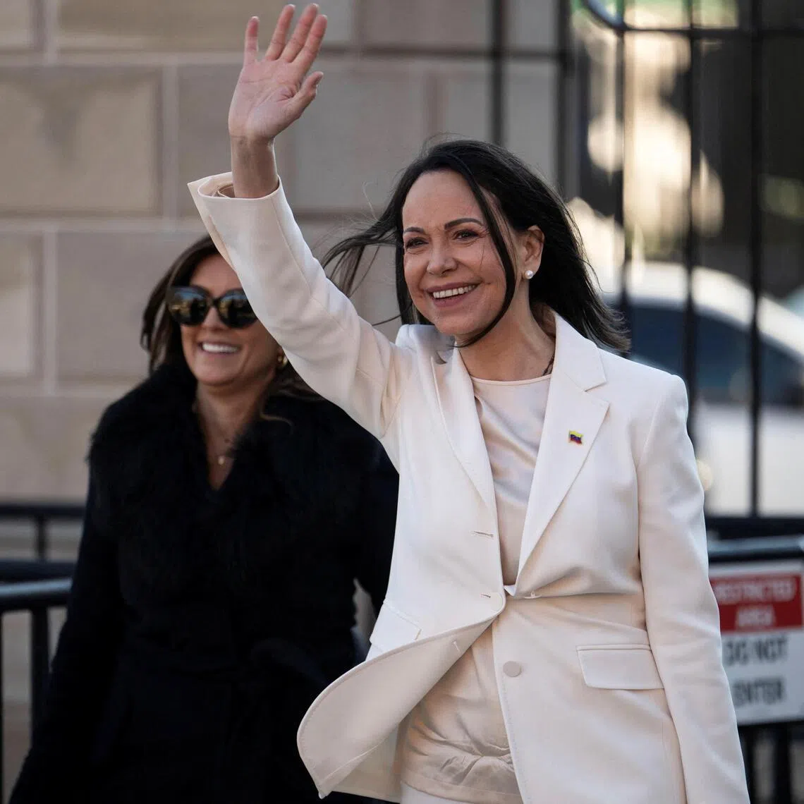 Venezuelan opposition leader Maria Corina Machado waves to supporters as she departs the White House following a meeting with US president Donald Trump on Jan 15. 