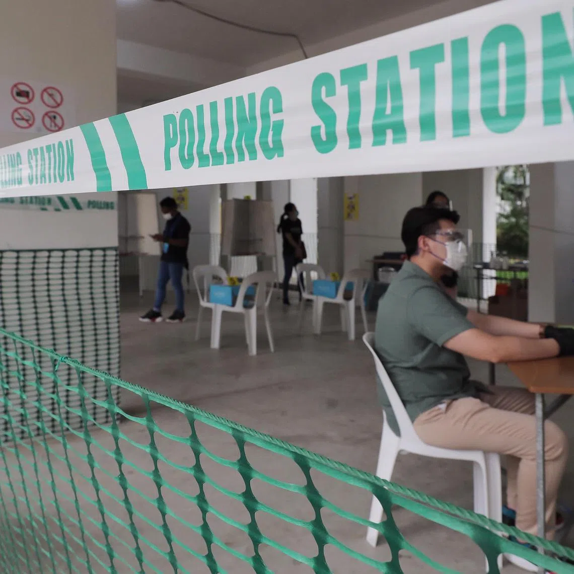 Polling officers setting up the polling centre at block 535 Bukit Panjang Ring Road on 9 July 2020.