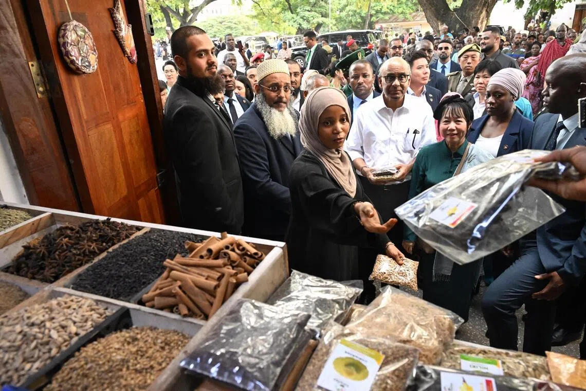 President Tharman Shanmugaratnam and his spouse Jane Ittogi Shanmugaratnam visiting a spice stall in Darajani Souk on June 10.