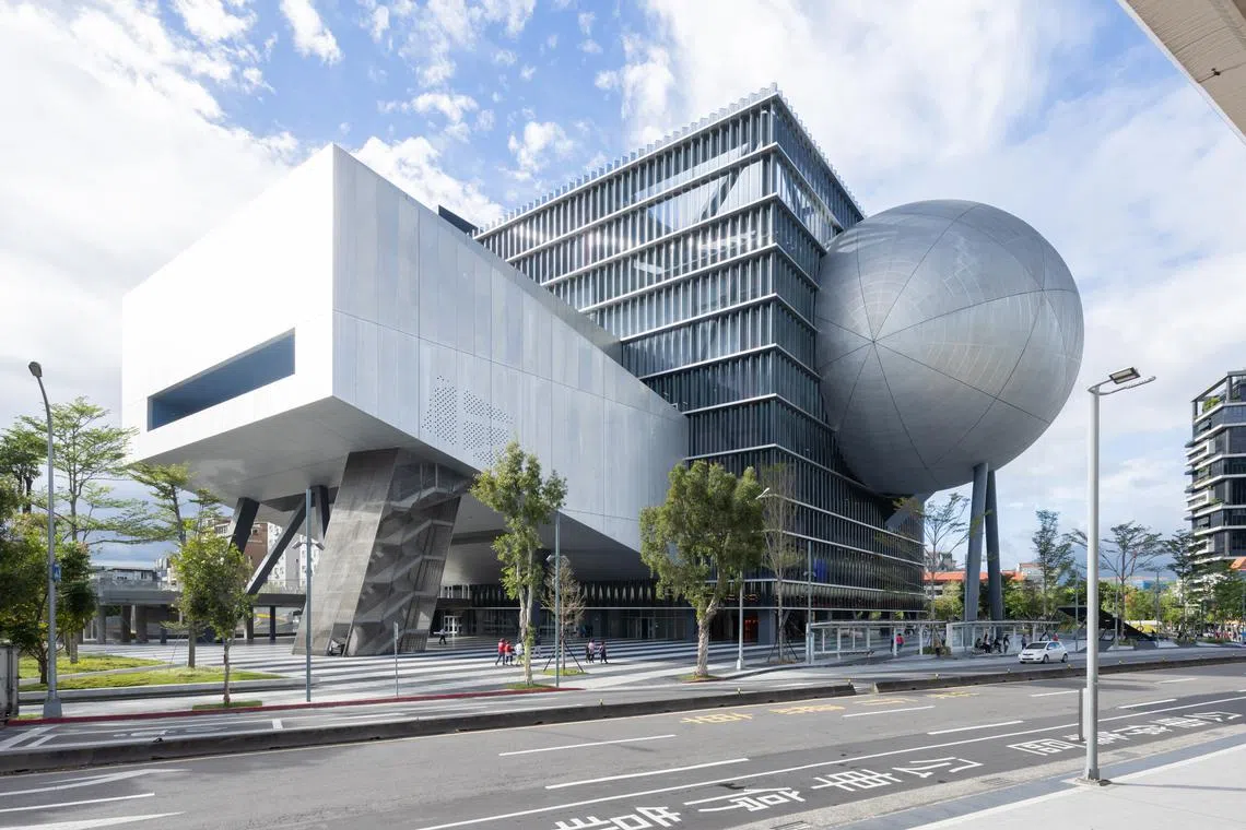 The Grand Theatre (left) and the spherical Globe Theatre (right) are part of the the new Taipei Performing Arts Center in Taiwan by international architectural firm OMA. 