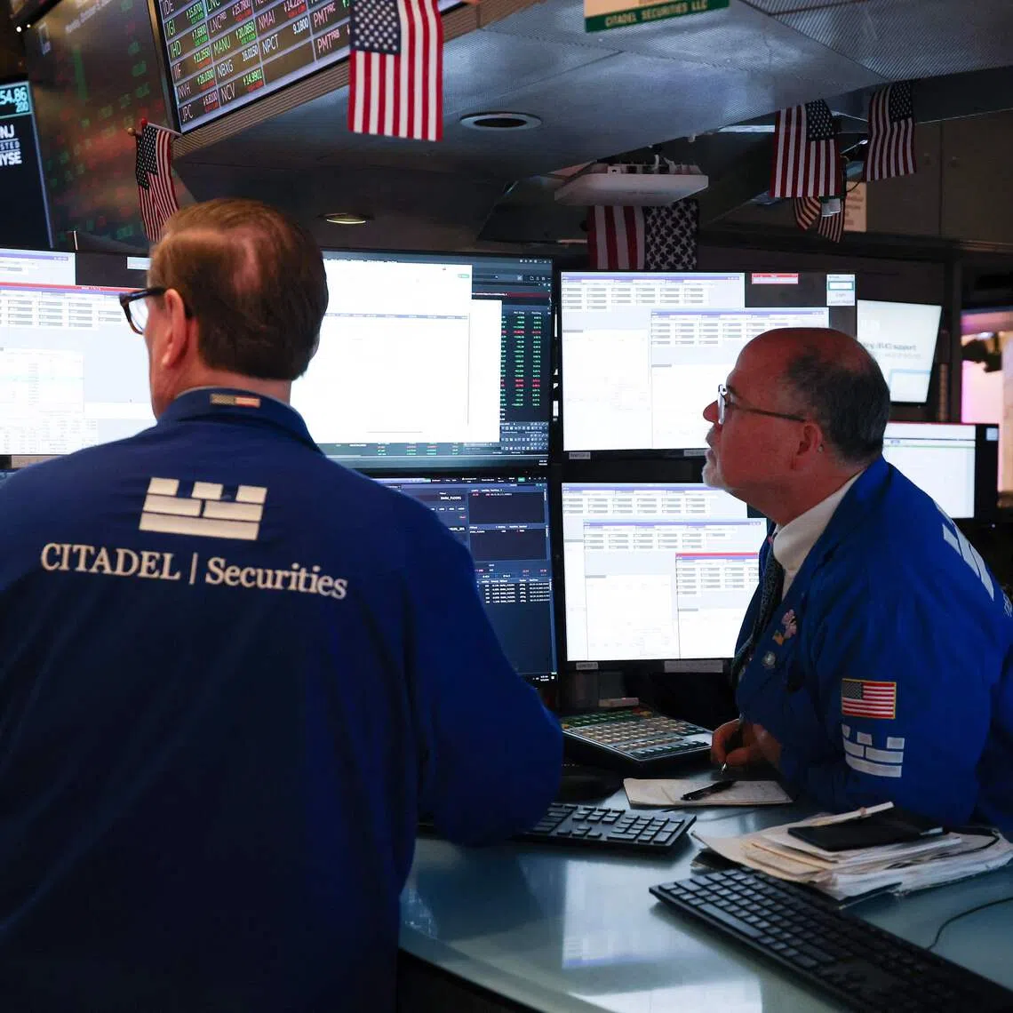 Traders work on the floor of the New York Stock Exchange at the opening bell, in New York City on Oct 5, 2026.