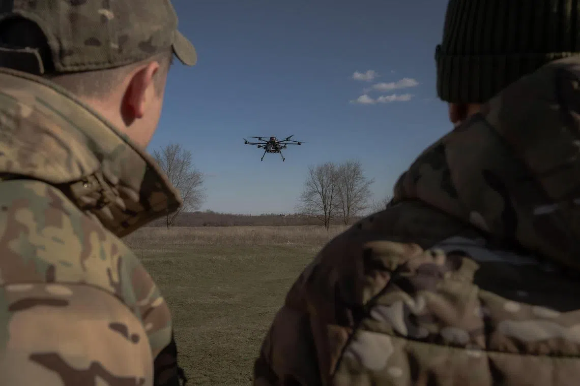 Ukrainian soldiers testing a Vampire hexacopter drone prior to a mission, in the Donetsk region of Ukraine.