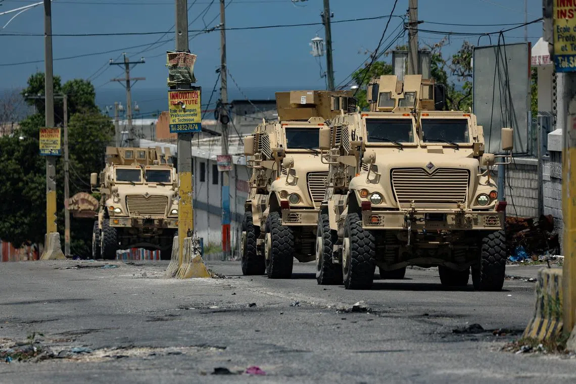 FILE PHOTO: Kenyan police forces patrol a neighbourhood in Port-au-Prince, Haiti September 4, 2024. REUTERS/Ralph Tedy Erol/File Photo