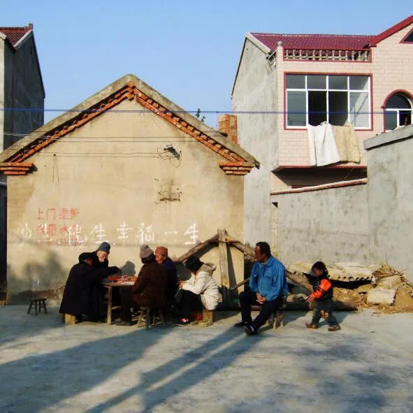 While two or three-storey houses are not uncommon in rural China today, Xiaogang is more neatly laid out and houses look a little more ornate than usual.