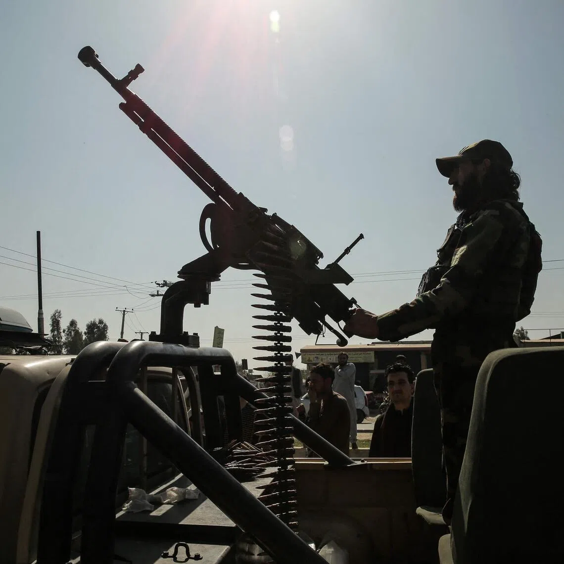 A Taliban security personnel rides an armed vehicle on the outskirts of Jalalabad on Feb 28, 2026, amid the ongoing clashes between Pakistan and Afghanistan.