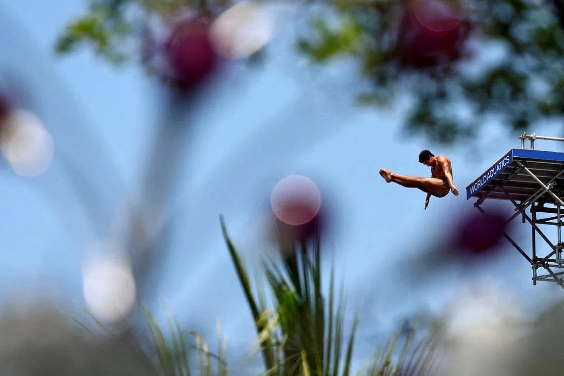 Brazil's Miguel Cardoso during the men's 27m high diving competition at the World Aquatics Championships in Singapore, July 24, 2025.